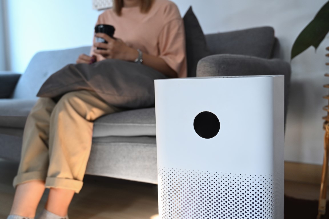 Air purifier in living room for filter and cleaning removing dus